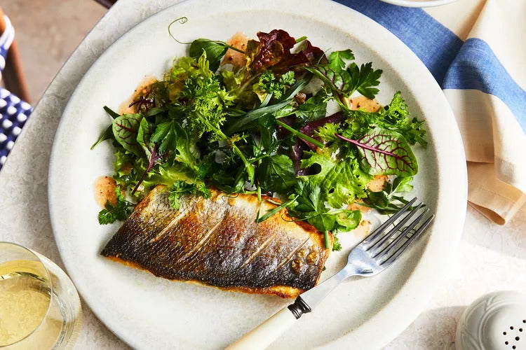 Branzino with Mesclun and Tomato–Herbes de Provence Vinaigrette